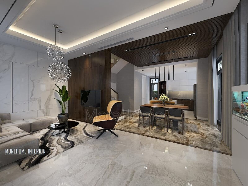 Điểm nhấn ấn tượng giữa gỗ ốp tường cùng đá lát sàn cao cấp tạo nên ánh nhìn hiện đại, độc đáo cho phòng khách liền bếp ăn. thiết kế biệt thự